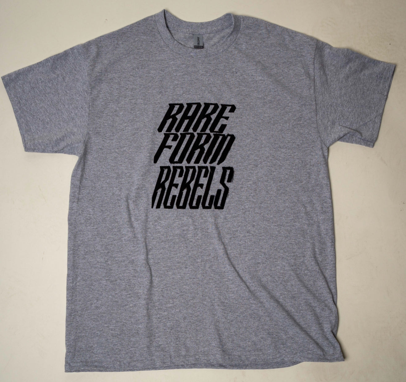 GREY RARE FORM REBELS PRICE IS UP TEE