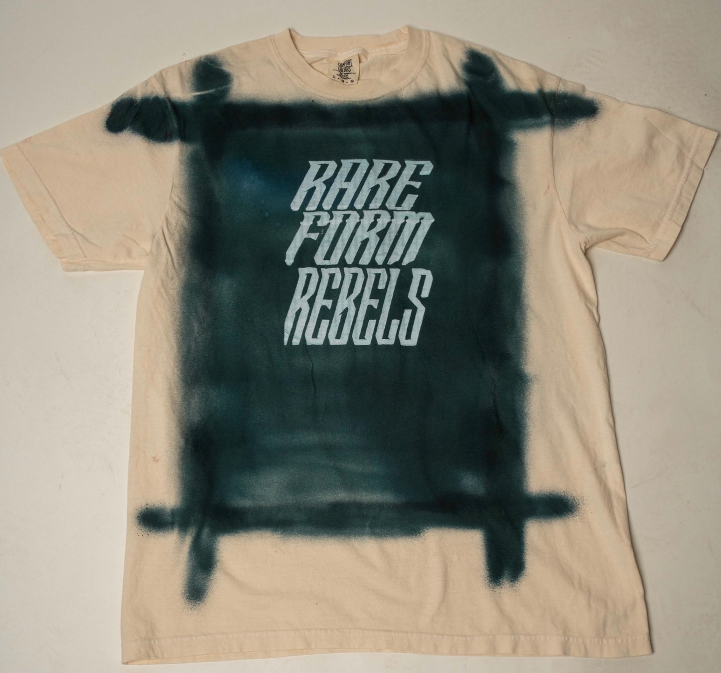 RARE FORM REBELS PRICE IS UP TEE