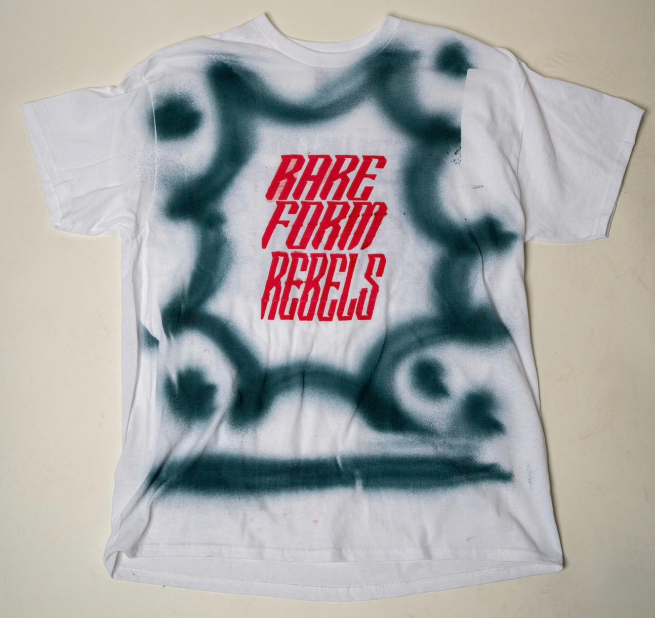 RARE FORM REBELS DYE SPRAY PRICE IS UP TEE